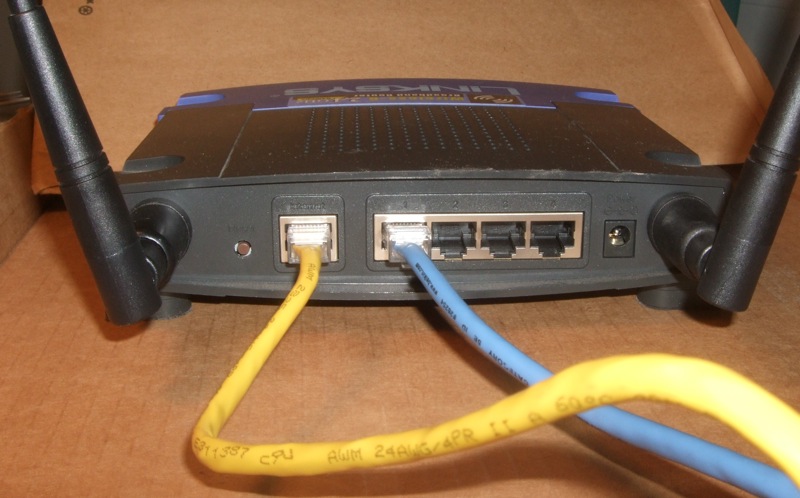 router with ethernet cables plugged in
