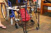 Photo of a device for wheelchair users that aids in shopping