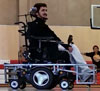 photo of a guard around a power wheelchair