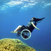 photo of underwater dancer in a wheelchair