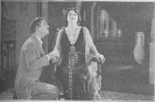 Clara Kimball Young seated with kneeling man