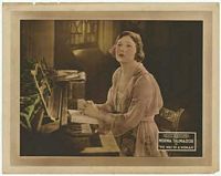 lobby card of Norma in Lucile Gown in The Way of a Woman