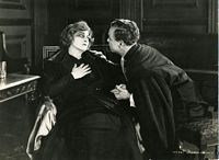 Film still from Madame X, Frederic, and Casson Ferguson