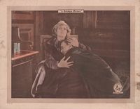 Film still from Madame X, Frederick and son