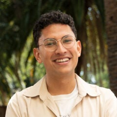 A portrait of smiling Stanford student Adam Nayak, '22